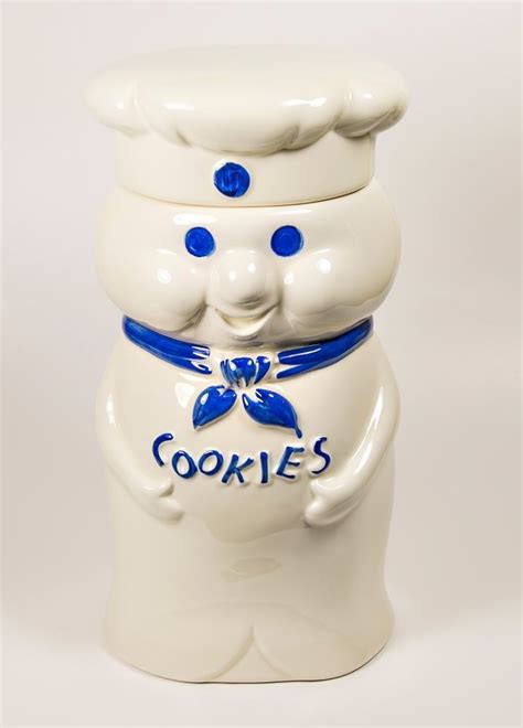 A mccoy cookie jar shows the doughboy carrying a red spoon. Vintage Pillsbury Dough Boy Cookie jar Promotional McCoy ...