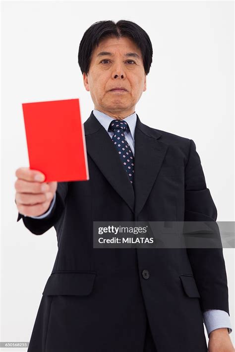 Japanese Men Put Out A Red Card High Res Stock Photo Getty Images