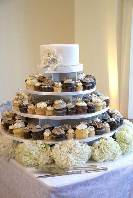 Love This Wedding Cupcake Tower With Big And Small Cupcakes In