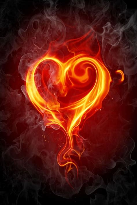 A Heart Made Out Of Fire On A Black Background