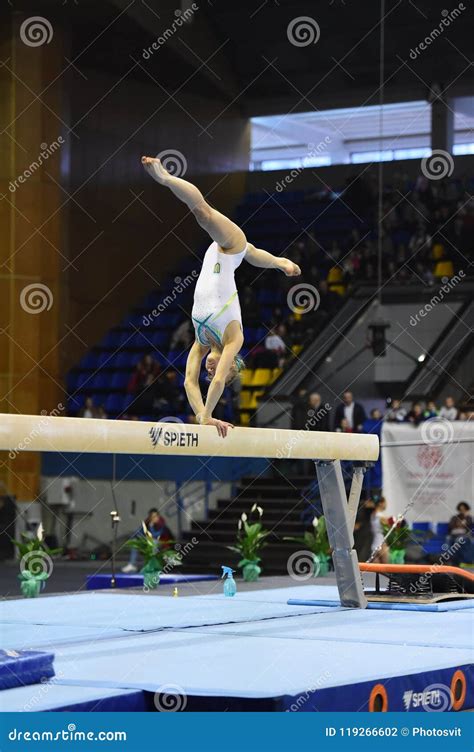 female gymnast performing on the balance beam during stella zakharova artistic gymnastics