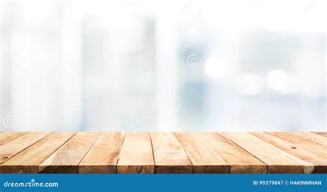 Wood Table Top On Blur Glass Window Wall Building Background Stock