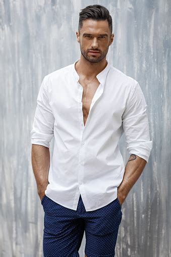 Handsome Man Wear White Shirt And Shorts Stock Photo