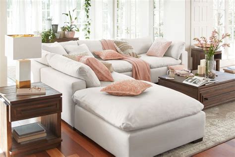 Plush 4 Piece Sectional And Ottoman Ivory American Signature