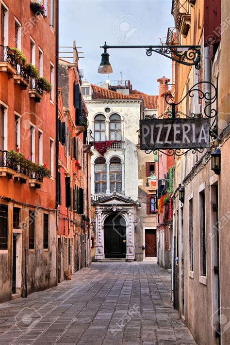 Typical venice street light at dusk, venice, italy. Quaint Street In Historic Venice, Italy With Pizzeria Sign ...