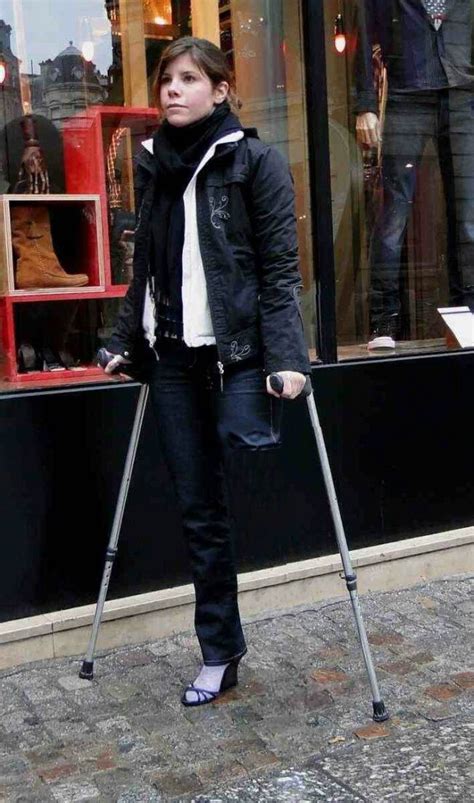 Lady Walking Crutches Amputees