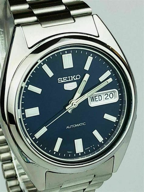 seiko 5 automatic blue dial silver stainless steel men s watch snxs77k1 watchnation