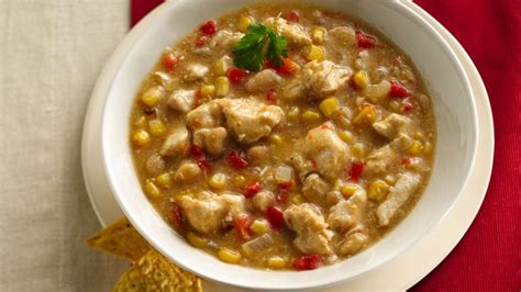 Add the beans, green chiles, garlic and chicken broth to the slow cooker and stir it all around. Slow-Cooker White Chicken Chili recipe from Betty Crocker