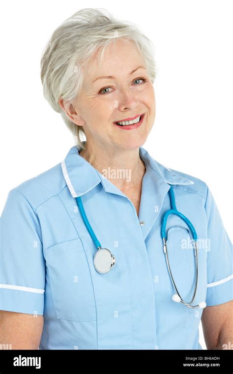 Studio Portrait Of Senior Nurse Stock Photo Alamy