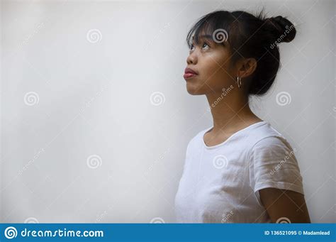Dark Skin Teenager Young Philippine Woman With Long Hair In White T