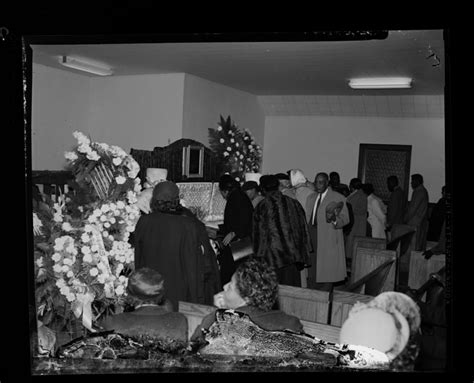 Indoor Funeral Service Mourners Standing By Open Casket Post Mortem