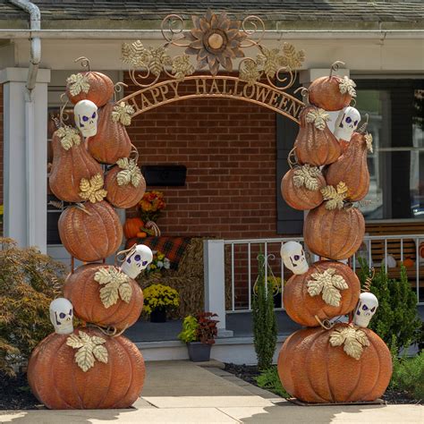 Happy Halloween Arch With Pumpkins And Skeletons