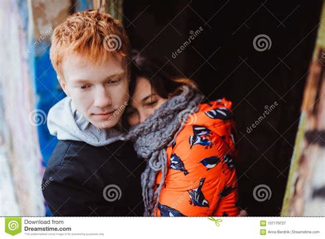 Young Couple In Love Hugging In The Old Part Of Town Stock Image
