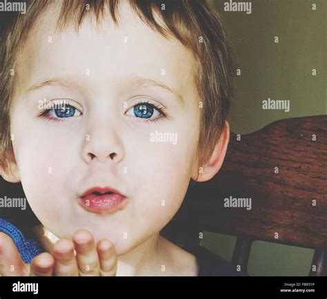 Boy Blowing Hi Res Stock Photography And Images Alamy