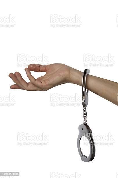 Handcuffed Woman Hand Isolated Over White Stock Photo Download Image