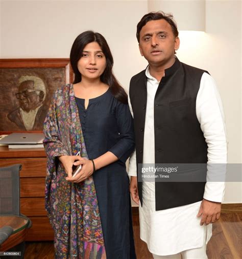 Uttar Pradesh Chief Minister Akhilesh Yadav With His Wife And News