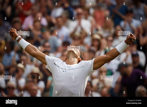 Rafael Nadal Stretches His Arms Up And Cheers After His Victory In