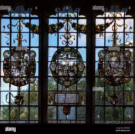 stained glass window of wreathed oval roundels in renaissance style by frederick charles eden
