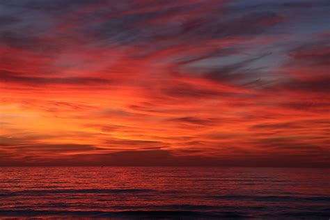Hd Wallpaper A Red Sky Sunset Over The Ocean Nature Beach Coast
