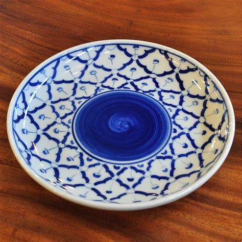 Named after one of sicily's famed aeolian island, the alicudi round ceramic plate features vibrant primary colors and a traditional sicilian. Thai round ceramic Plate 18,5x2,5cm buy cheap online
