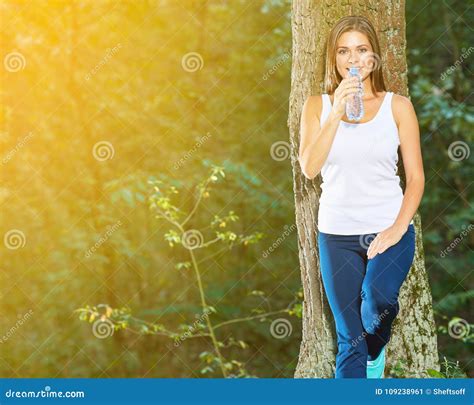 Young Woman Drink Water In Forest From Bottle Stock Image Image Of