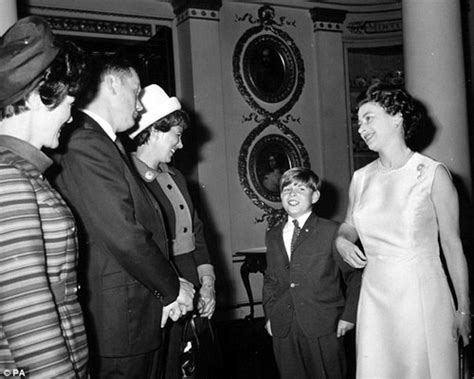 Janet armstrong, wife of neil armstrong, sitting on floor with her two sons, attentively watching tv at home as the lunar module lands on the moon. Neil Armstrong and his then wife Jane(left),meet Queen ...