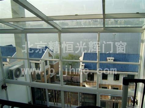 什么是断桥铝合金门窗的特点 北京门窗厂阳光房断桥铝门窗铝木复合门窗 北京精恒光辉门窗公司