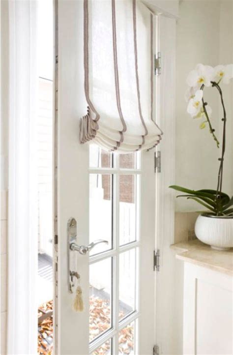 Alternating stripes of cream and brown make a subdued filter for. French Door Shade French Door Curtains Stripes Modern ...