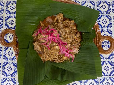 Drain the red onions and set out in a serving bowl to top each portion, along with the salsa to cautiously dab on. Cochinita Pibil, the jewel of the Yucatán Peninsula food