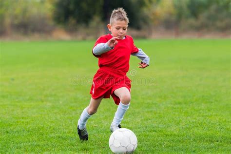 Boy Kicking Soccer Ball Stock Image Image Of Children 84842829