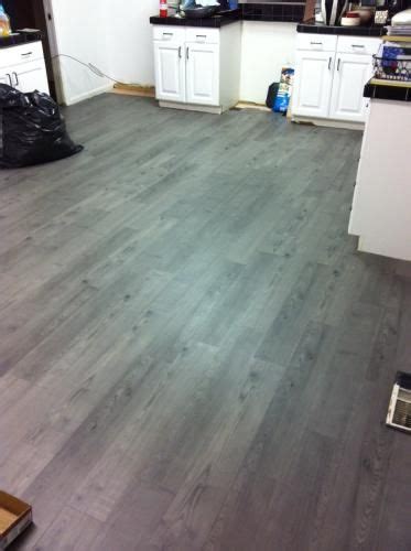 Trafficmaster laminate flooring is inexpensive and recommended for those that want to try their hand at flooring a room the easy way. TrafficMASTER Allure Allure 6 in. x 36 in. Satin Oak Luxury Vinyl Plank Flooring (24 sq. ft ...