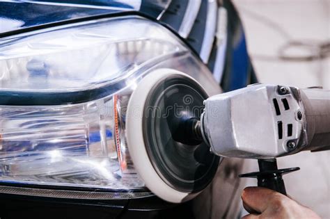 Polishing Car Headlights At Shallow Depth Of Field Stock Photo Image