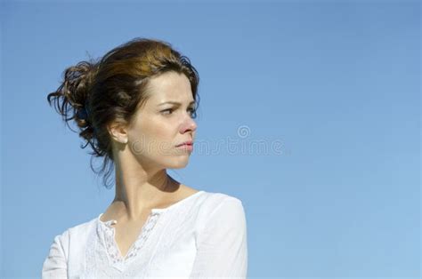 Pretty Young Woman Looking Back Over Her Shoulder Stock Photo Image