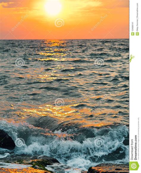 Waves Hitting Rocky Shores At Sunset Stock Image Image Of Power