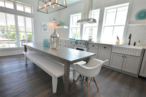 Our own design and finish create a unique look on a barn wood style dining table. Gray Dining Table - Cottage - kitchen - Lollygag Beach House