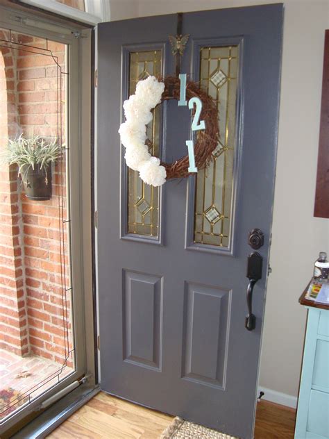 Exterior doors are kept looking good by general wipes every now and again. Home Sweet Home: Front Door and Rachel's Painting Tips
