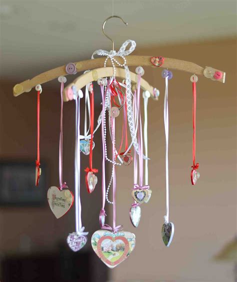 Handmade Hanging Mobile Using Wood Hangers And Hearts Of Your Choice