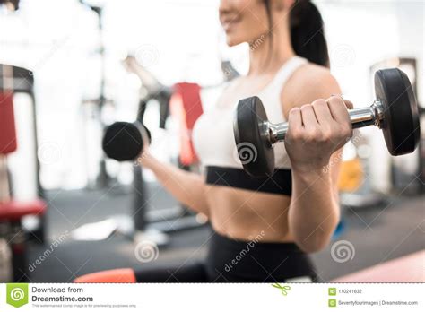 Woman Training With Weights In Gym Stock Photo Image Of Health