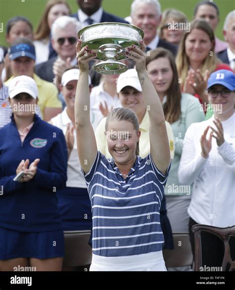 jennifer kupcho holds the championship trophy after the final round of the augusta national