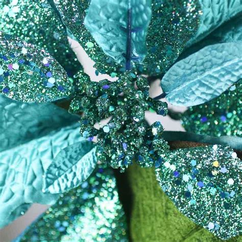 Maybe you would like to learn more about one of these? Turquoise Sparkling Satin Artificial Poinsettia Stem ...