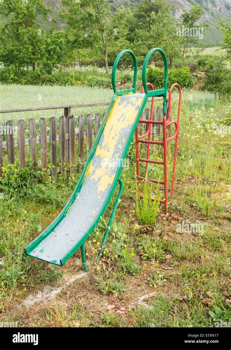 Children S Slide In Overgrown Playground In Rural Village In Spain
