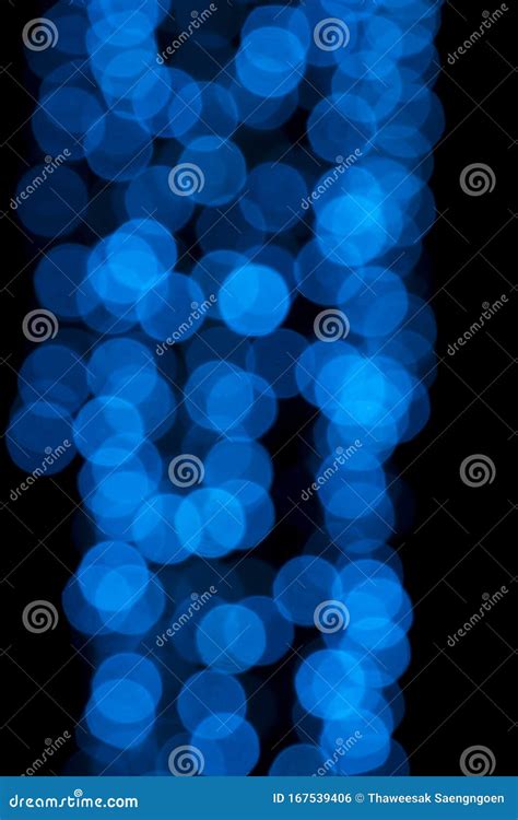 Defocused Of Blurred Blue Bokeh Circle Light From Lighting Bulb In The