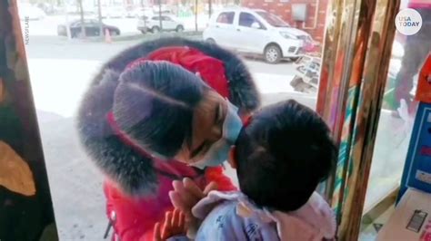 Coronavirus Nurse Helping Fight Outbreak Kisses Son Through Window