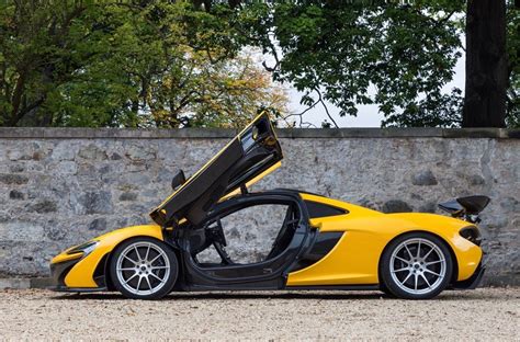 A standard mclaren p1 not rare enough for you? McLaren P1 painted in Volcano Yellow w/ exposed carbon ...