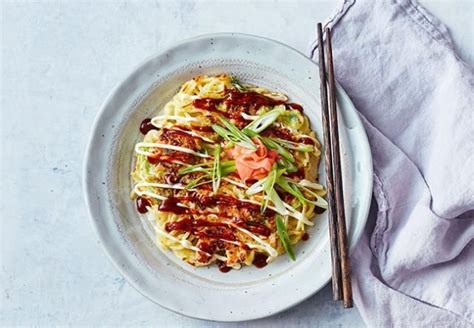 Okonomiyaki (literally means 'grilled as you like it') is a savory version of japanese pancake, made with flour, eggs, shredded cabbage, meat/ protein and topped with a variety of condiments. Japanese Okonomiyaki Recipe | Australia's Best Recipes