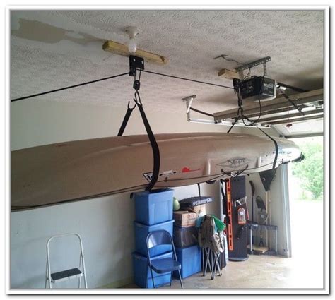 Some use pulleys, ropes, cables. Diy Overhead Garage Storage Pulley System | Diy overhead ...
