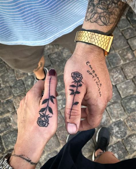 Matching Couple Hand Tattoos | Hand tattoos for guys, Small hand tattoos, Hand and finger tattoos