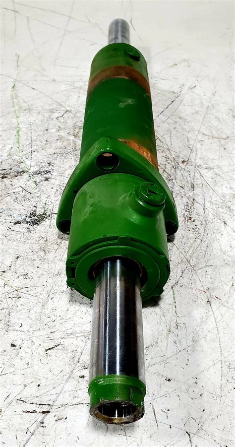 NEW O E M JOHN DEERE MFWD POWER STEERING CYLINDER Anderson Tractor Inc