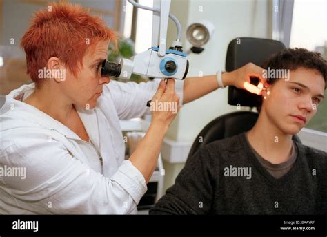 Ent Specialist Treating A Patient Berlin Germany Stock Photo Alamy