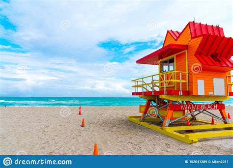 Colorful Lifeguard Hut Under A Cloudy Sky In Miami Beach Stock Image